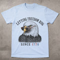 WZ_eagle_letting_freedom_ring_shopify_comfort_colors_1717_flatlay_1_mockup_chambray