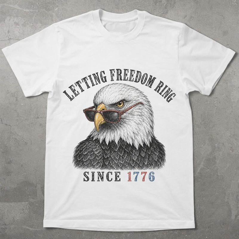 WZ_eagle_letting_freedom_ring_shopify_comfort_colors_1717_flatlay_1_mockup_white