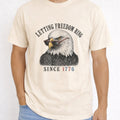 WZ_eagle_letting_freedom_ring_shopify_comfort_colors_1717_mccaffrey_mockup_ivory
