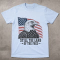 WZ_eagle_still_land_of_the_free_shopify_comfort_colors_1717_flatlay_1_mockup_chambray