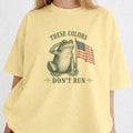 WZ_frog_these_colors_dont_run_shopify_comfort_colors_1717_mockup_woman_2_butter
