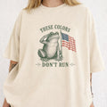 WZ_frog_these_colors_dont_run_shopify_comfort_colors_1717_mockup_woman_2_ivory