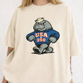 WZ_mascot_manat_250_shopify_comfort_colors_1717_mockup_woman_2_ivory