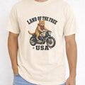 WZ_motorcycle_cat_land_of_the_free_shopify_comfort_colors_1717_mccaffrey_mockup_ivory