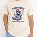 WZ_raccoon_stars_and_stripes_forever_shopify_comfort_colors_1717_mccaffrey_mockup_ivory