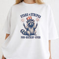 WZ_raccoon_stars_and_stripes_forever_shopify_comfort_colors_1717_mockup_woman_2_white