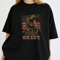 WZ_trex_home_of_the_brave_black_shopify_comfort_colors_1717_mockup_woman_2_black