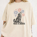 WZ_wolf_made_in_america_fireworks_shopify_comfort_colors_1717_mockup_woman_2_ivory